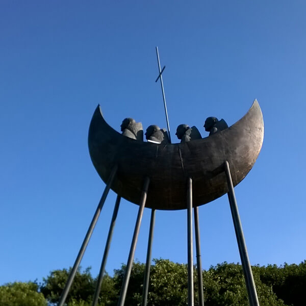 Statue of monks in a boat